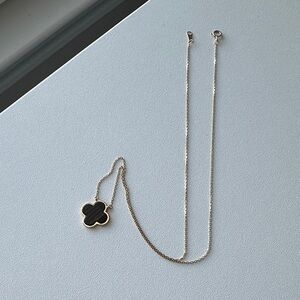 Elegant 14K Yellow Gold and Black Clover Pendant Necklace